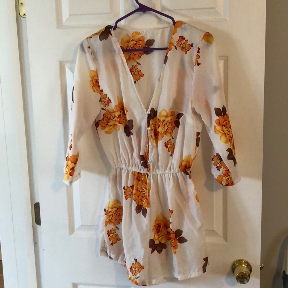 White romper with flowers